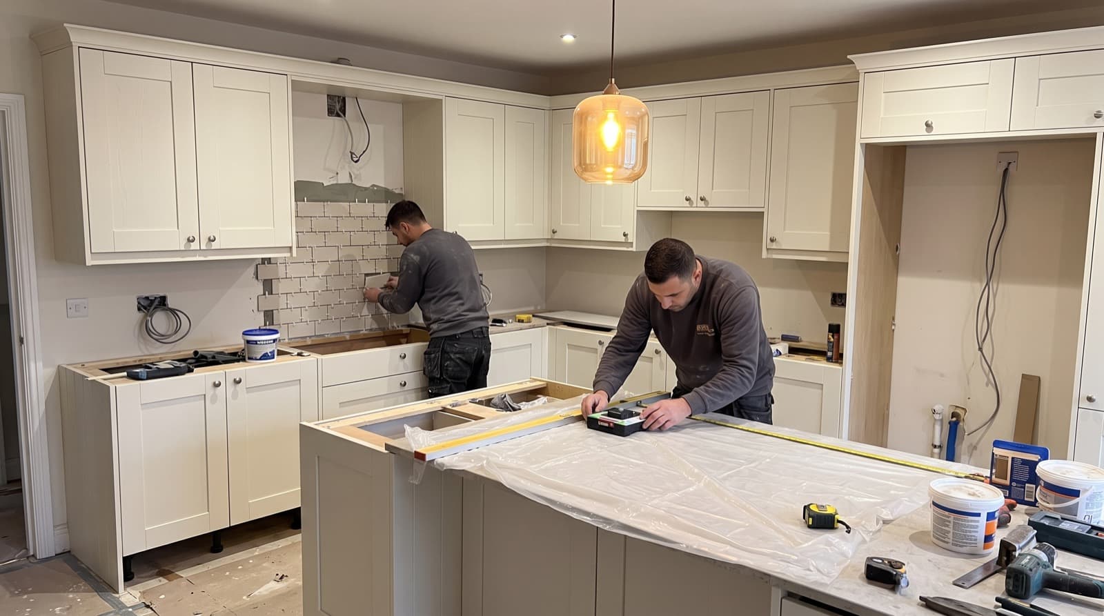 Fitted kitchen with island and modern units in a Birmingham home